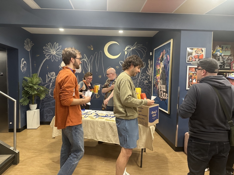 Creators getting their lanyards and checking in